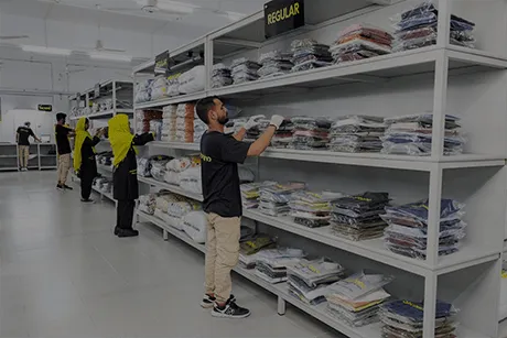 Jab chaho staff arranging shirts in the racks